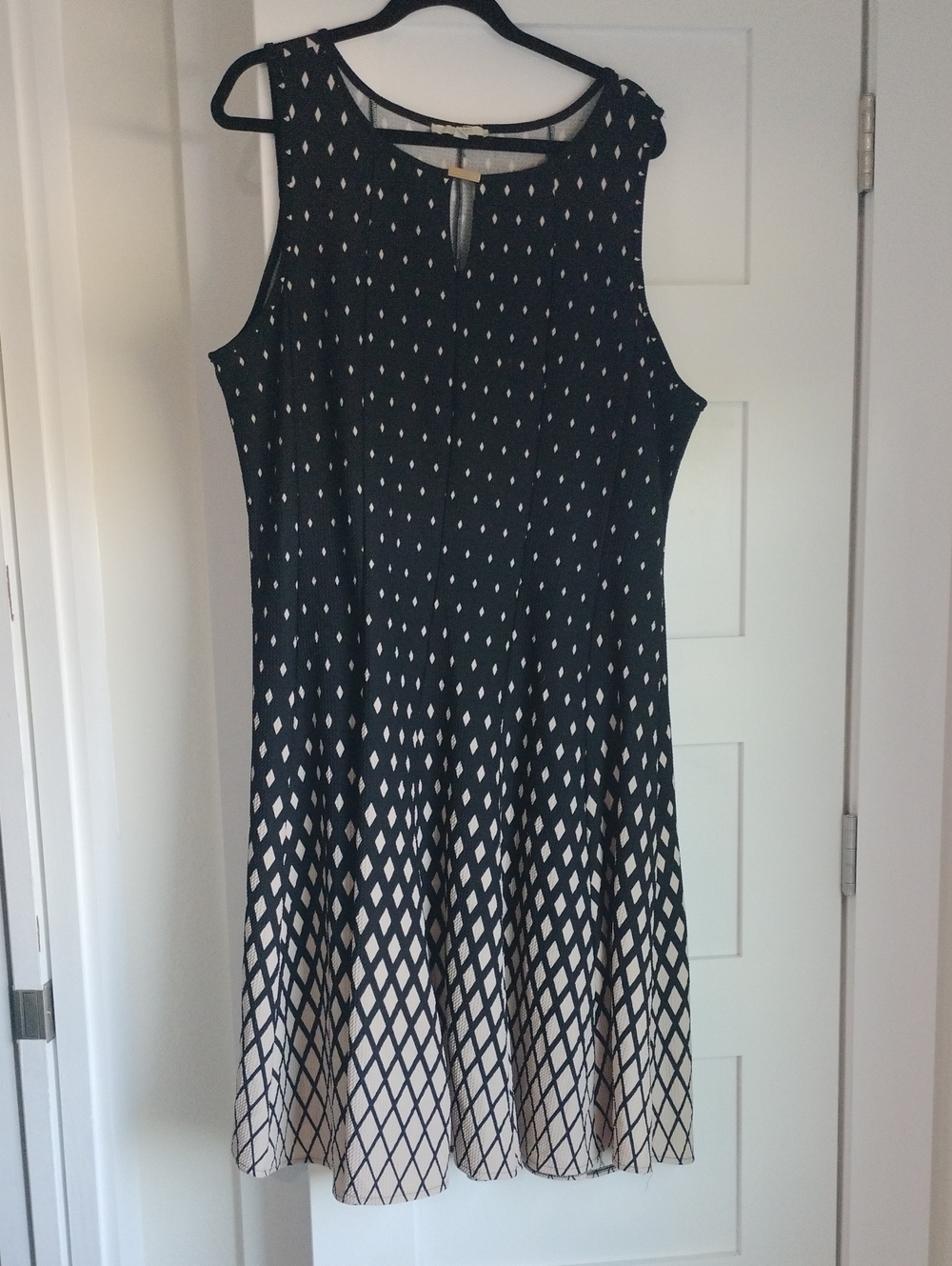 Haani Sleeveless Black and Tan Patterned A-Line Dress